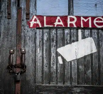 red and white wooden door with love print