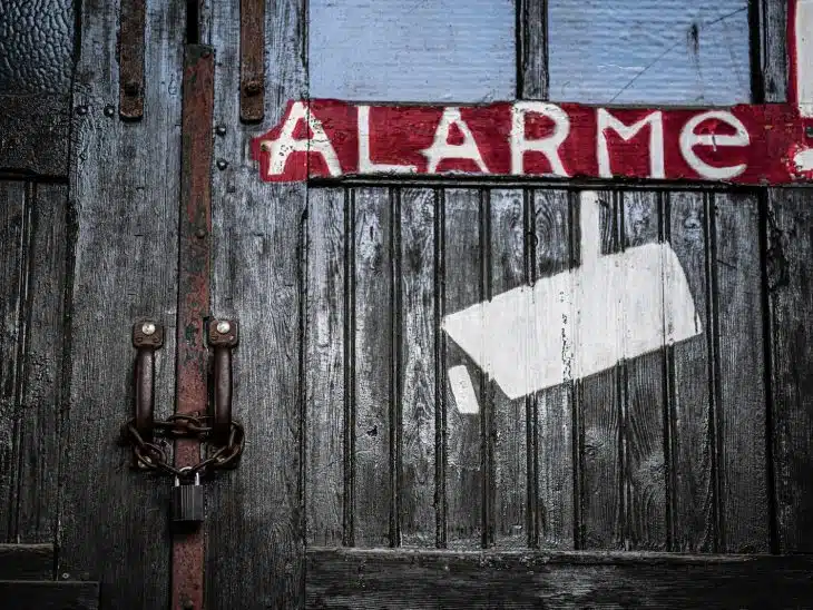 red and white wooden door with love print