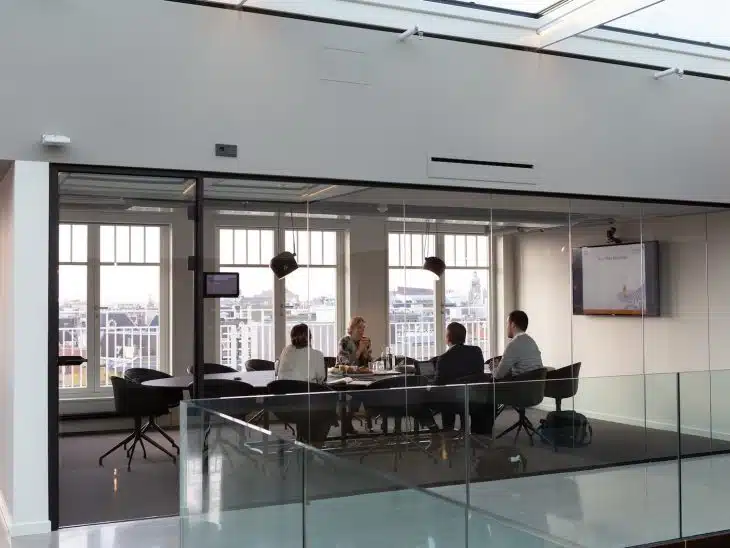 people sitting on chair inside building